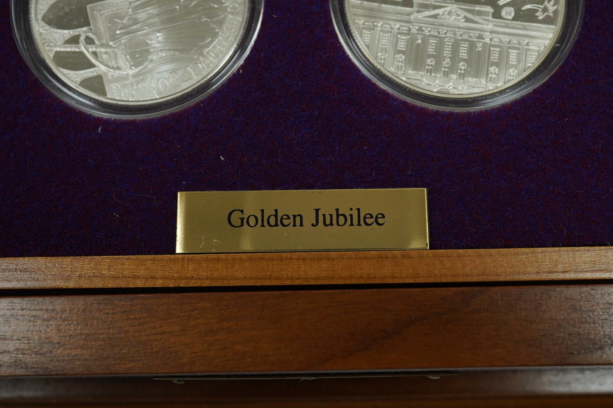 Royal Mint UK QEII Golden Jubilee collection of 24 silver proof coins, 2002, each 28.28g, in wood case fitted with two trays, with individual certificates and album